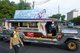 Jeepneys are the most popular means of public transportation in the Philippines. They were originally made from US military jeeps left over from World War II and are known for their flamboyant decoration and crowded seating. They have become a ubiquitous symbol of Philippine culture.